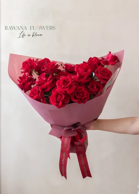 Classic Red Roses Hand Bouquet in Blush Wrap