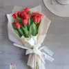 Classic Red Tulips Hand Bouquet White Wrap UAE | باقة توليب أحمر كلاسيكية بتغليف أبيض الإمارات